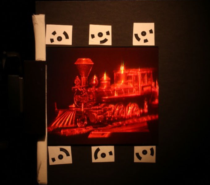 Stephen A. Benton, "Engine #9," reflection hologram, glass, 1975. Photo courtesy of Pengxiao Hao.