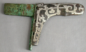 Anonymous, Chinese Dagger-axe (Ge), Eastern Zhou dynasty, Warring States period (480–221 BCE), 3rd/2nd century BCE. Bronze inlaid with silver; 20 x 13 cm. The Art Institute of Chicago: Gift of Russell Tyson (AIC1950.1627).