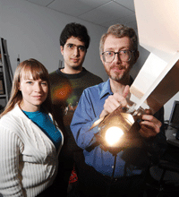 Students Amy Gooch and Ankit Mohan with professor Jack Tumblin