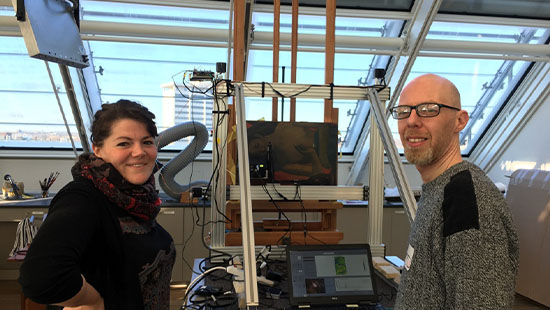 Former NU-ACCESS postdoctoral fellows  Emeline Pouyet (left) and Gianluca Pastorelli (right) while conducting MA-XRF analysis of “Poèmes Barbares.” Source: Marc Walton 