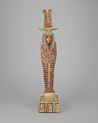 Statue of Ptah-Solar-Osiris, Ptolemaic Period (332-30 BCE), Wood preparation layer, pigment gold,  and textile, Gift of Phoenixx Ancient Art, S.A. 2002.542 Art Institute of Chicago