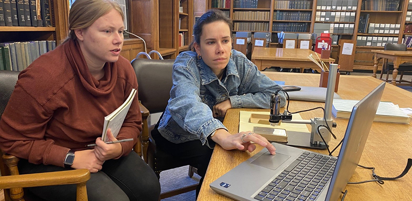 Post-doctoral fellows Madeline Meier and Hortense de La Codre conduct the study in NU Special Collections.